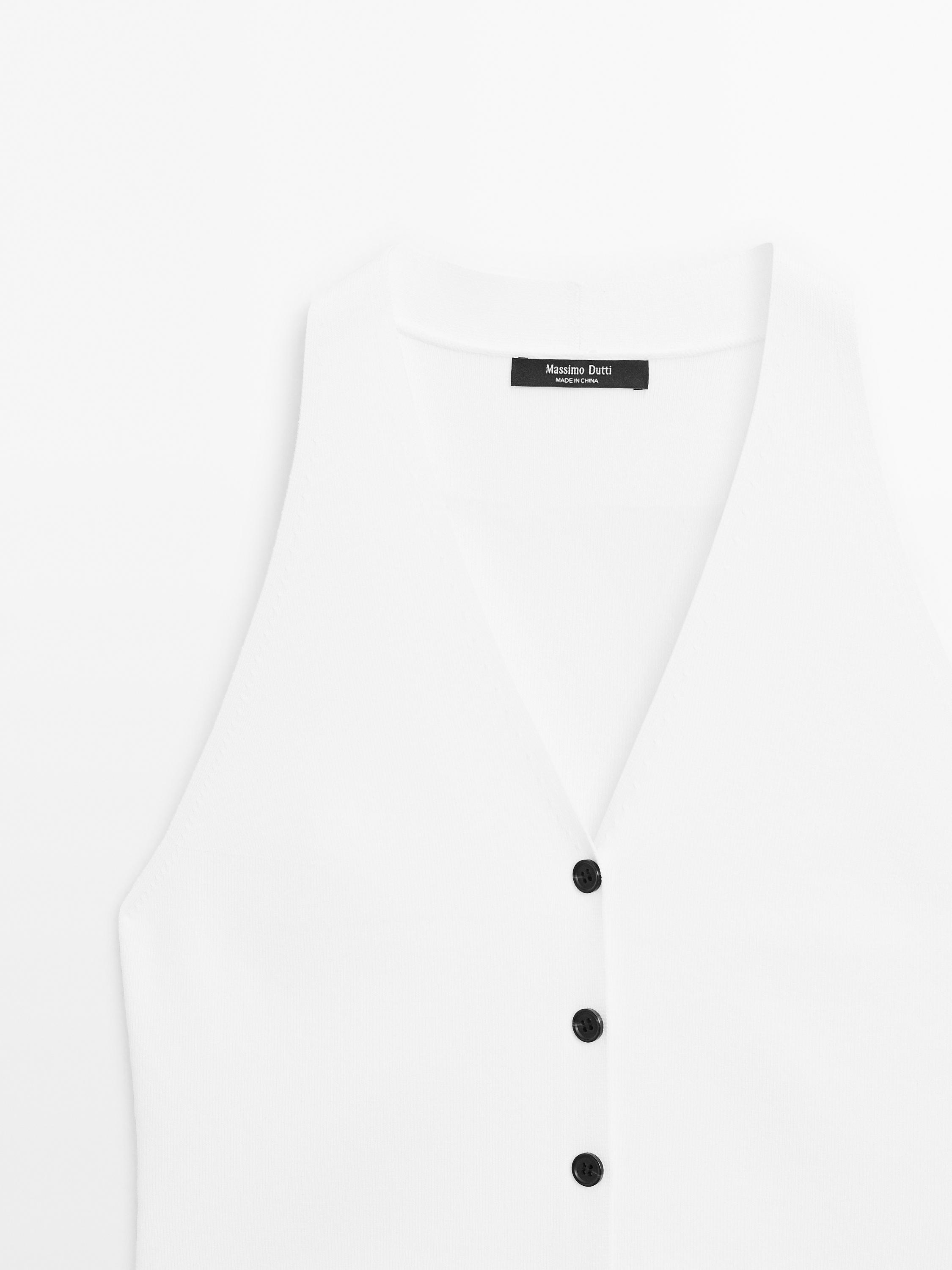 Knit waistcoat with contrast buttons